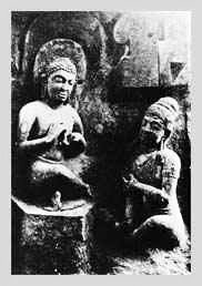 Sandstone Buddha in preaching mudra, with richly dressed man at his feet. From Kyauk-taw, Arakan and may date from as early as 400 A.D