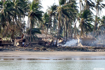 Residents work to rebuild the nearly 100 per cent of homes destroyed by Cyclone Giri in Kyuntharyar village, Myebon Township, Arakan State, Burma, on October 27. The Category Four storm hit the state’s coast bearing winds in excess of 120 miles per hour (193 km/h) at 4 p.m. five days earlier. More than 70 per cent of fish and prawn farms along Kannar road were destroyed in this town, the economy of which is partly dependent on aquaculture. Photo: Mizzima