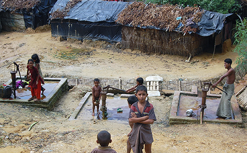 Children are plying near block drainage