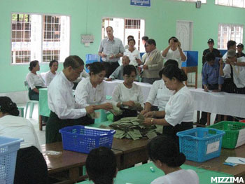 Vote counting is done at a polling booth in Dagon Township in Rangoon in front of foreign diplomats and local journalists during the November 2010 national election. Photo Mizzima