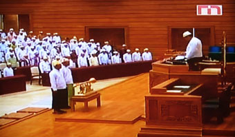 This TV grab taken off Myanmar's state-run MRTV shows lawmakers taking part in the opening session of the country's new parliament in the capital Naypyidaw on January 31, 2011. Burma's new junta-dominated parliament opened on January 31 as lawmakers assembled in secrecy following a widely panned election for the country's first legislative session since the late 1980s. AFP PHOTO/MRTV