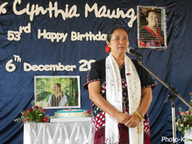 Dr. Cynthia Maung speaking at her birthday