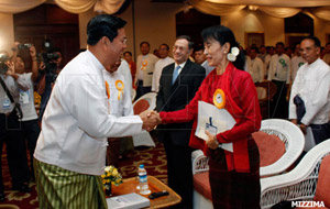 suu-kyi-and-hla-tun-on-work