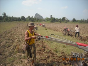 Villagers-forced-to-plough-a-farm-field