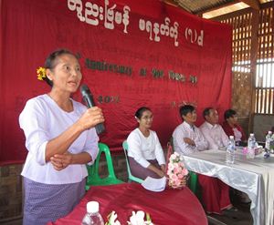 A woman from Japanese Well Village gave a speech