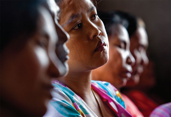 Chin women in a photograph from the report 