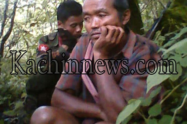 Burmese soldiers at the Pangsai (Kyukok)  frontline in northern Shan state.