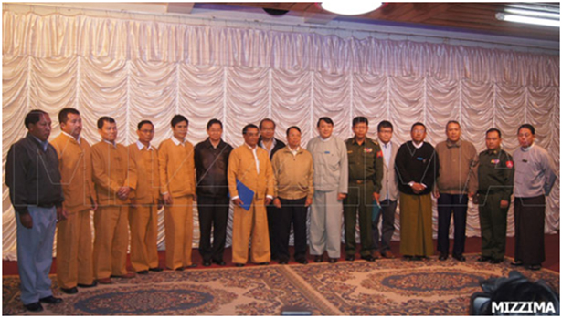 The RCSS/SSA and government delegates after the signing of the state-level ceasefire agreement on 2 December 2011. Lt-Col Sai Ngeun is third from left. (Photo: Mizzima)