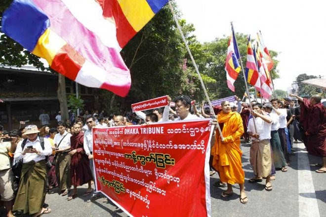 Protesters outside the Bangladesh embassy in Yangon on March 26