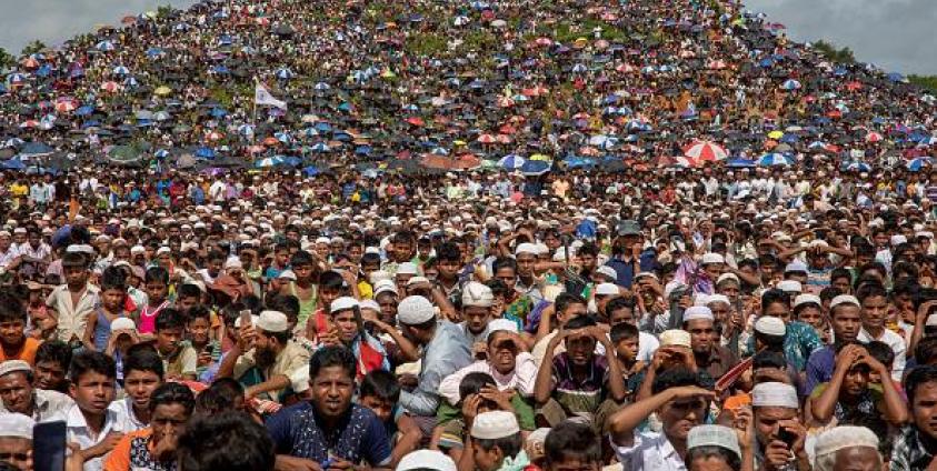 https://www.hrw.org/ | Rohingya refugees gather in an open field at Kutupalong refugee camp in Ukhia, Cox’s Bazar, Bangladesh to commemorate the two-year anniversary of the Myanmar military’s ethnic cleansing campaign in Rakhine State on August 25, 2019. © 2019 K M Asad/LightRocket via Getty Images