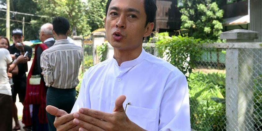 (Files) Kyaw Min Swe, chief editor of 'The Voice' weekly journal, talks to reporters after his trial at the Dagon township court in Yangon, Myanmar, 05 October 2012. Photo: Nyein Chan Naing/EPA