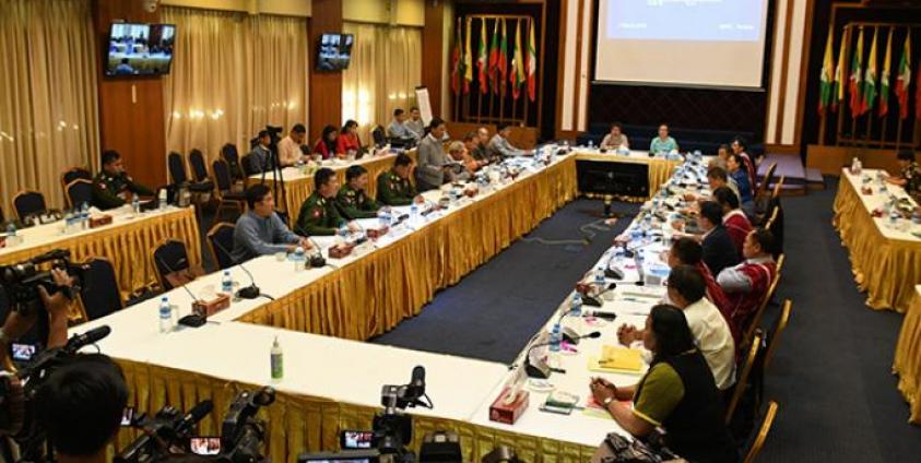 Government representatives and the representatives of (NCA-S EAO) hold the bilateral coordination meeting at National Reconciliation and Peace Centre in Yangon yesterday. Photo: MNA