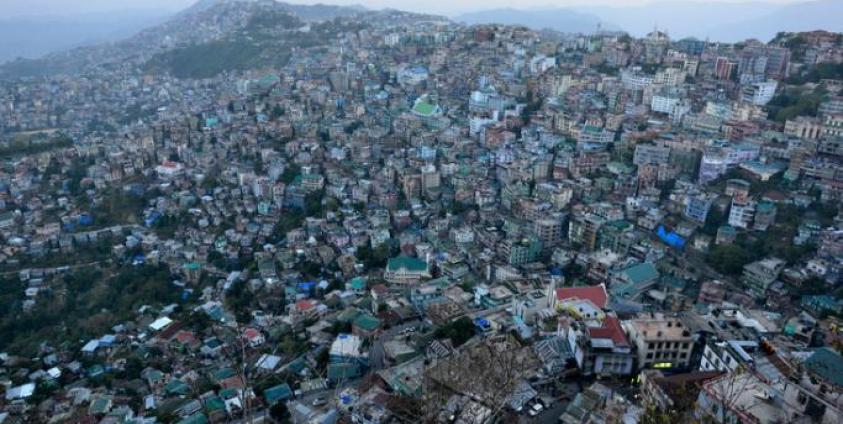 A bird's eye view at dusk, of Aizawl city, the capital of Mizoram India. Photo: EPA