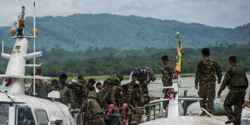 Myanmar soldiers arrive at Buthidaung jetty in Myanmar's Rakhine State on August 29, 2017. Photo: AFP