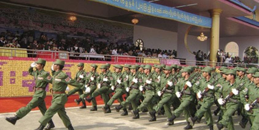 Photo by SHAN- the United Wa State Army (UWSA) soldiers march on the 20th anniversary in the Headquarters Pangsang in 2009.