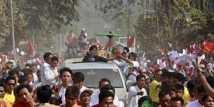 Aung San Suu Kyi campaigns during 2015 election. Photo: Mizzima