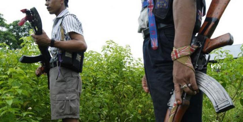 (File) Cadres of the United Liberation Front of Asom (ULFA) stand guard at a hideout camp near Amarpur inTinsukia district, some 600 kms from Guwahati, the capital city of India’s northeastern state of Assam on June 27, 2008. Photo: AFP