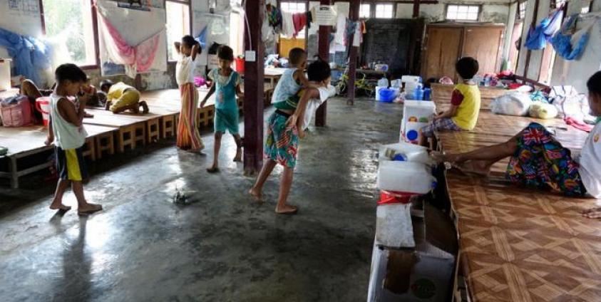 Rakhine ethnic children, who fled from conflict areas, take refuge at A Myo Thar Monastery temporary camp in Sittwe, Rakhine State. Photo: Nyunt Win/EPA