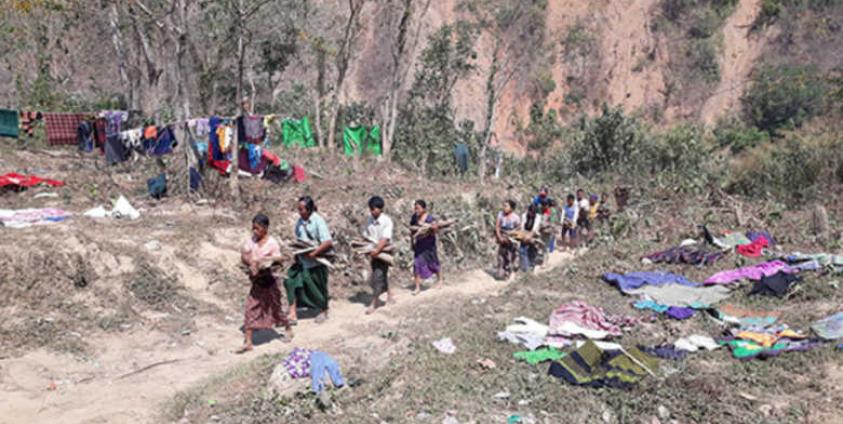  Chin villagers fleeing from the Burma Army jet attacks. Photo-FBR 