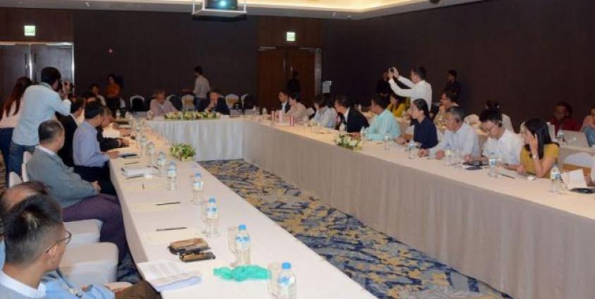 Assistant Professor Mr. Lyu Xing from Yunnan University Southeast Asia Study Department delivers the speech at the discussion on China-Myanmar Sustainable Development Cooperation in Yangon. Photo: MNA