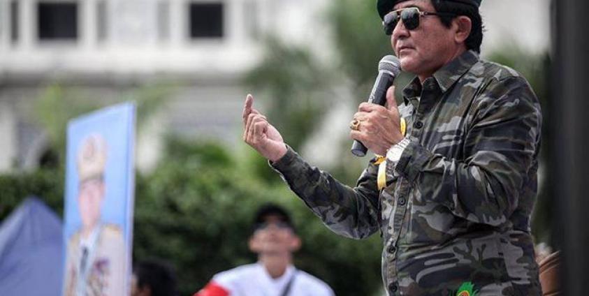 Former member of the upper house of parliament Hla Swe speaks during a rally to denounce the US sanctions imposed on senior Myanmar military officials, in Yangon on 03 August, 2019. Photo: Thura/Mizzima