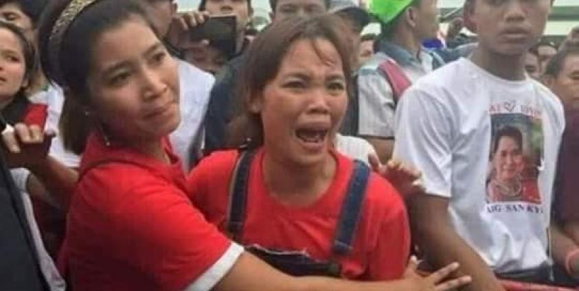 Burmese workers outside Talay Hall upset because they were unable to see Aung San Suu Kyi