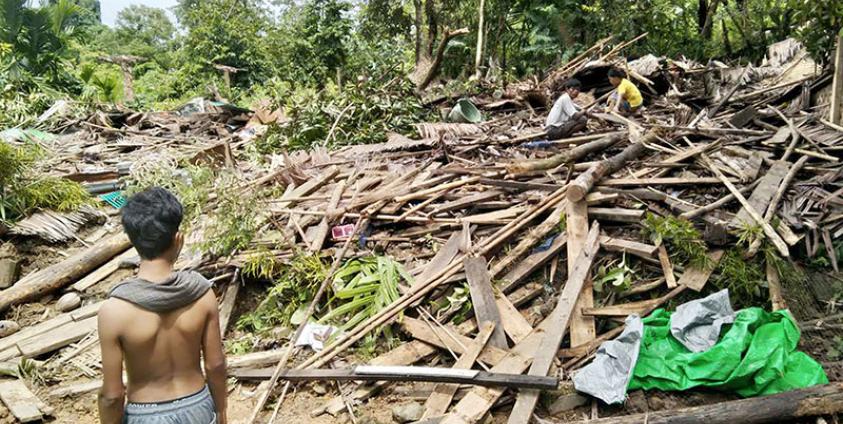 Demolished homes in Jaithar Village and the scene of a beach near the village.