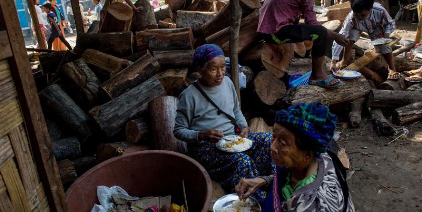 This picture taken on May 11, 2018 shows internally displaced people in a church compound in Myitkyina after fleeing conflict between government troops and ethnic armed group in Kachin state. Photo: Ye Aung Thu/AFP