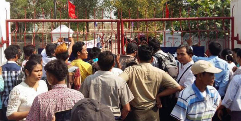 File photo: Relatives await released prisoners at prison's front gate