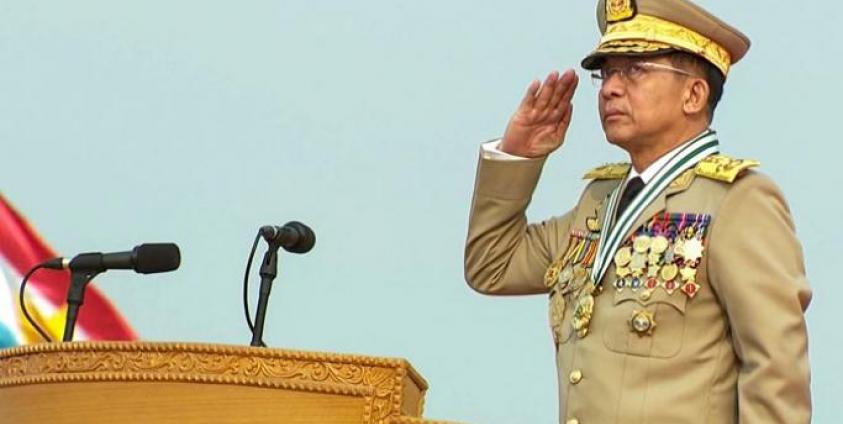 In this file screengrab provided via AFPTV and taken from a broadcast by Myawaddy TV in Myanmar on March 27, 2021, Myanmar armed forces chief Senior General Min Aung Hlaing salutes during an annual parade put on by the military to mark Armed Forces Day in the capital Naypyidaw. Photo: AFP