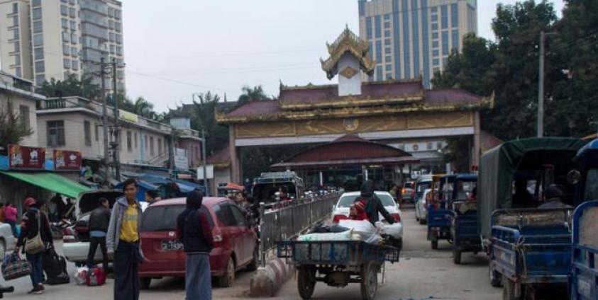 People at the Muse town border gate in Myanmar's Shan State as they wait to cross into China. Photo: Ye Aung Thu/AFP