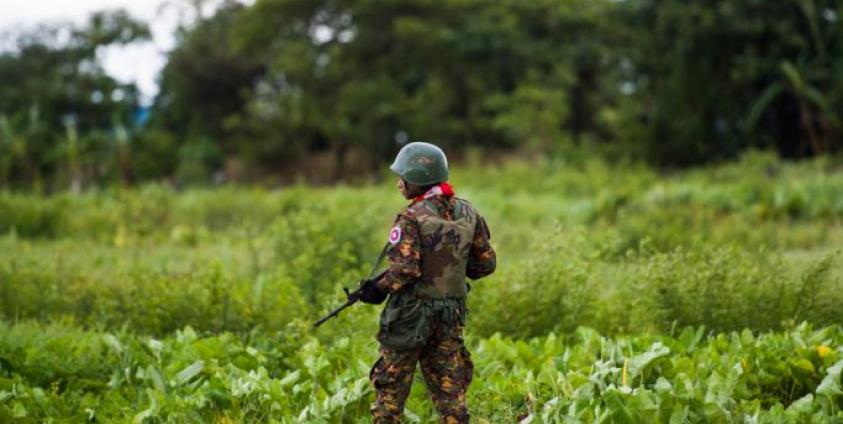 A Myanmar soldier guards an area at Sittwe airport in Rakhine State on September 20, 2018. Photo: AFP