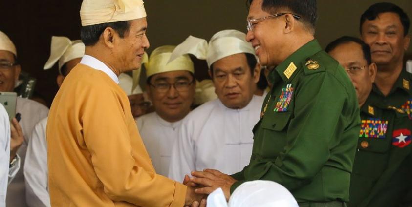 Myanmar's new president Win Myint, seen here with Myanmar Military chief Min Aung Hlaing, right, promised to look at the country's military-written constitution, corruption and human rights in his inaugural speech. Photo: Min Min for Mizzima