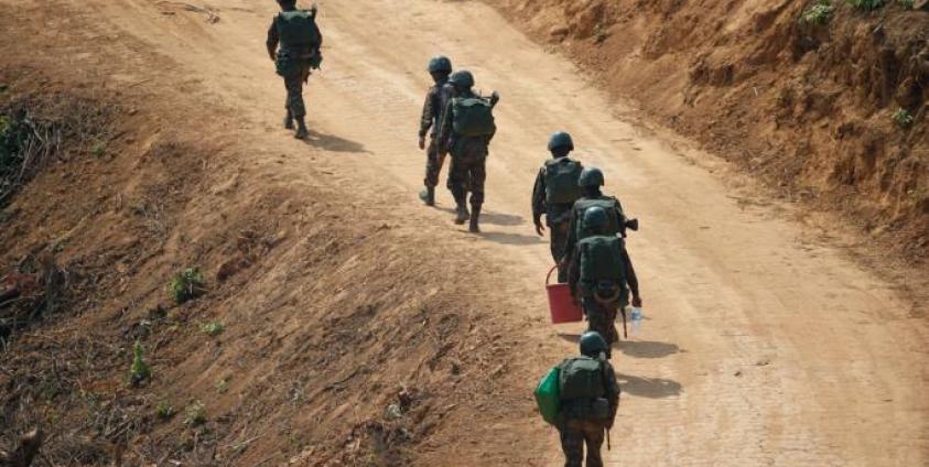 (File) Soldiers walk near the command center during the first day of 'Sin Phyu Shin' joint military exercises in Ayeyarwaddy delta region, Myanmar. Photo: EPA