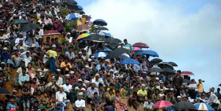 Rohingya refugees attend a ceremony organised to remember the second anniversary of a military crackdown that prompted a massive exodus of people from Myanmar to Bangladesh, at the Kutupalong refugee camp in Ukhia on August 25, 2019. Photo: Munir Uz Zaman/AFP