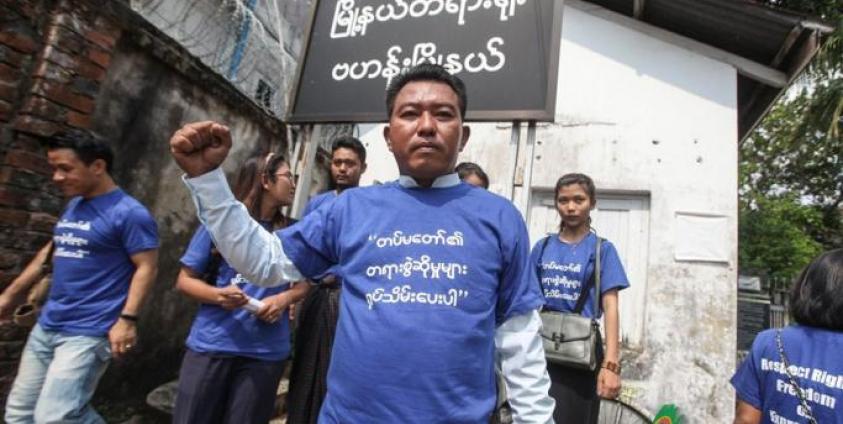 Myat Kyaw who is one of 17 accused in ‘Stop War’ campaign case is seen in front of Bahan court on May 24. Photo: Thura/Mizzima