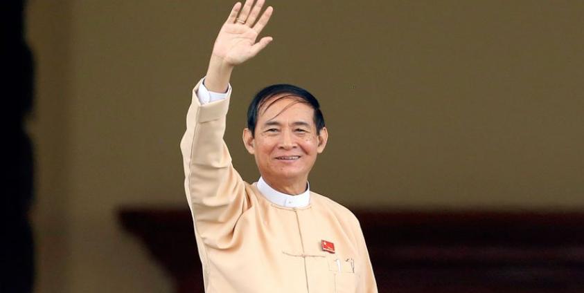 Newly elected president Win Myint and member of the National League for Democracy (NLD) party waves after the voting ceremony at Union parliament session in Naypyitaw, Myanmar, 28 March 208. Photo: Hein Htet/EPA-EFE