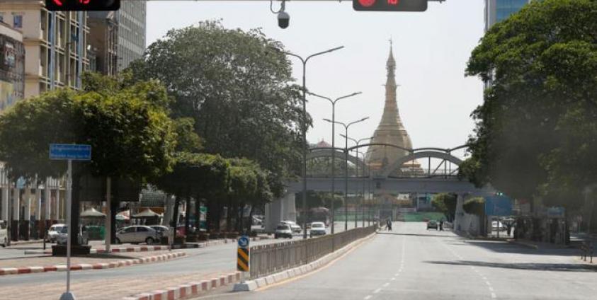 Nearly empty is the Sule pagoda road in downtown Yangon, Myanmar, 01 February 2022. Photo: EPA