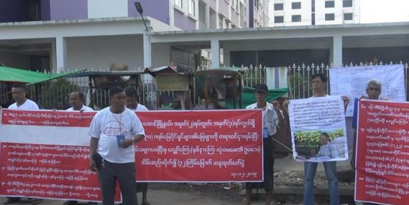 Protesters in demonstration and leader Myint Aung in this protest. Photo: Chan Nyein/Mizzima