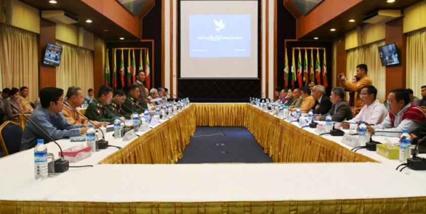 Government delegation and ten Ethnic Armed Organizations hold a preliminary coordination meeting yesterday at the National Reconciliation and Peace Centre in Yangon. Photo: MNA