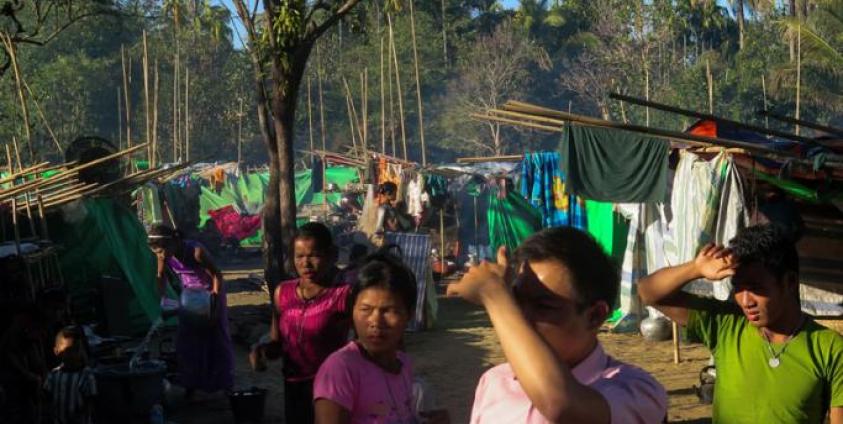 People, displaced by violence between ethnic Rakhine rebels and Myanmar's army, gather at a makeshift camp in Kyauktaw, Rakhine state. Photo: AFP