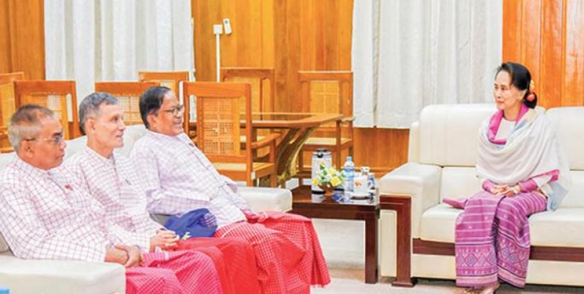 State Counsellor Daw Aung San Suu Kyi meets with New Mon State Party Chairman Nai Han Thar and party at the NRPC in Nay Pyi Taw on January 30. Photo: MNA