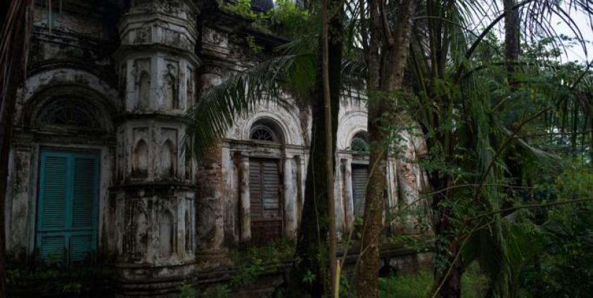 The run down Jama mosque, a center of Islamic worship in Sittwe built 1859 is seen with overgrowth of vegetation after it was permanently closed in 2012 following deadly clashes with Muslims and Buddhists. Photo: AFP