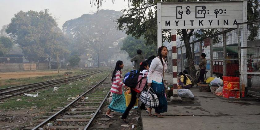 Myanmar women walk on a platform at the train station in Myitkyina, northern Kachin state, Myanmar. Photo: AFP