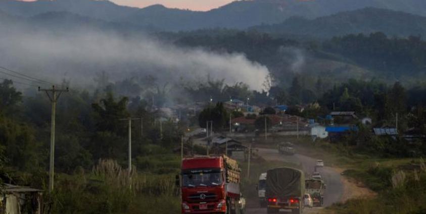 Trucks travelling along a road near Muse in Myanmar's Shan state, near the border to China. Photo: Ye Aung Thu/AFP