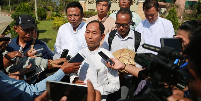 (File) Four Eights Party (8888 party) leader Ko Ko Gyi (C) talks to the media after starting the party's registration process at the Union Election Commission (UEC) Office in Naypyitaw, Myanmar, 19 December 2017. Photo: Hein Htet/EPA