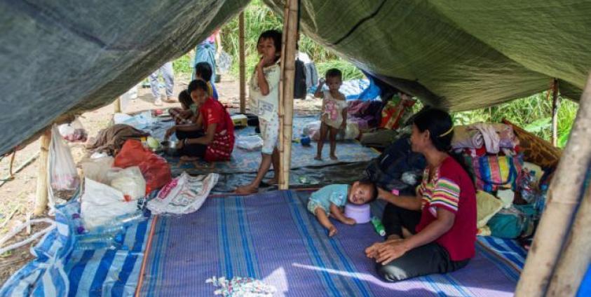 Myanmar refugees and their children, who fled a surge in violence as the military cracks down on rebel groups, at a camp in Nawphewlawl near the Myanmar-Thailand border in Kayin state. Photo: AFP