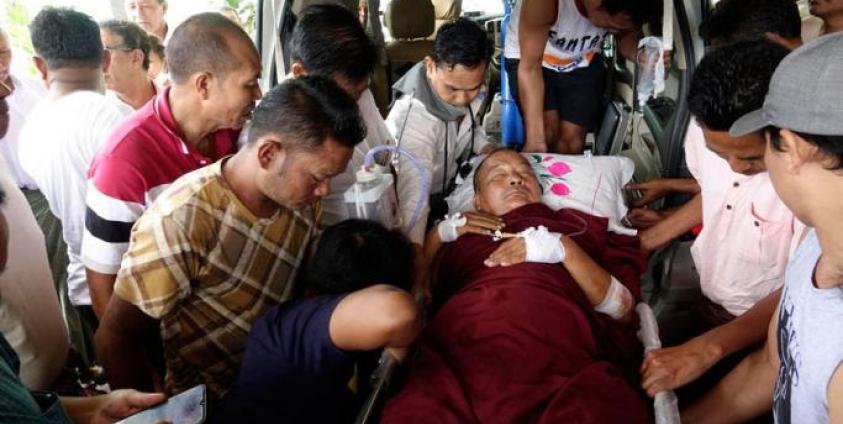 An injured monk is brought to the Sittwe Hospital in Sittwe, Rakhine State, Myanmar, 01 October 2019. Five people were reportedly injured after Myanmar security forces opened fire in the village of Mein Wa near Kyauk Taw township. According to local media reports, approximately 50,000 people have fled to temporary camps in recent weeks as fighting continues in the restive Rakhine state. Photo: Nyunt Win/EPA