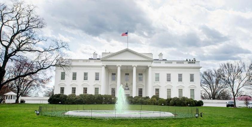 The fountain on the North Lawn of the White House is seen dyed green in Washington, DC, USA. Photo: EPA