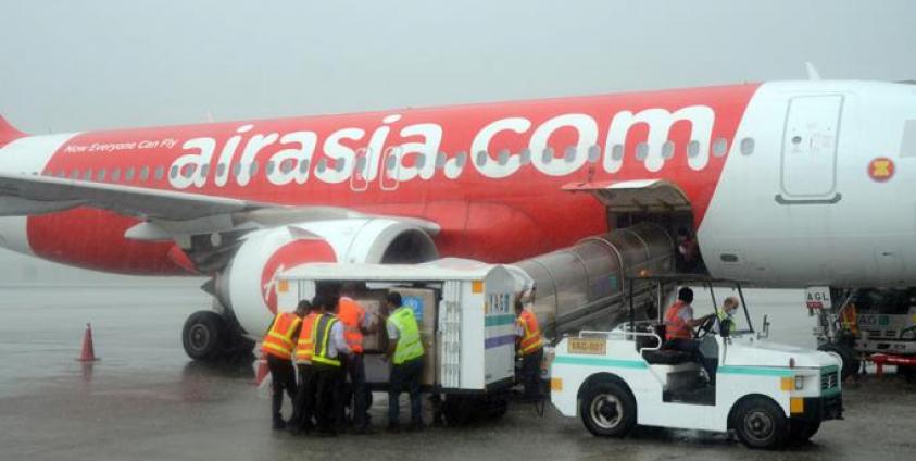 Workers unloading medical supplies from the special flight at the Yangon International Airport on 31 May 2020. Photo: MNA